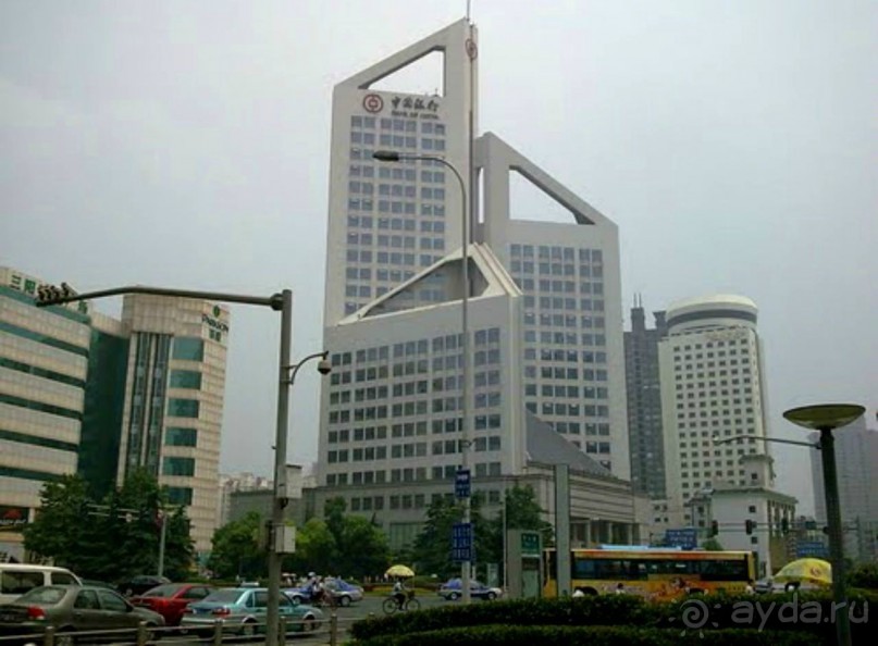 УСИ (WUXI) Китай