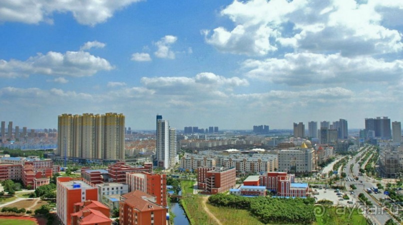 УСИ (WUXI) Китай